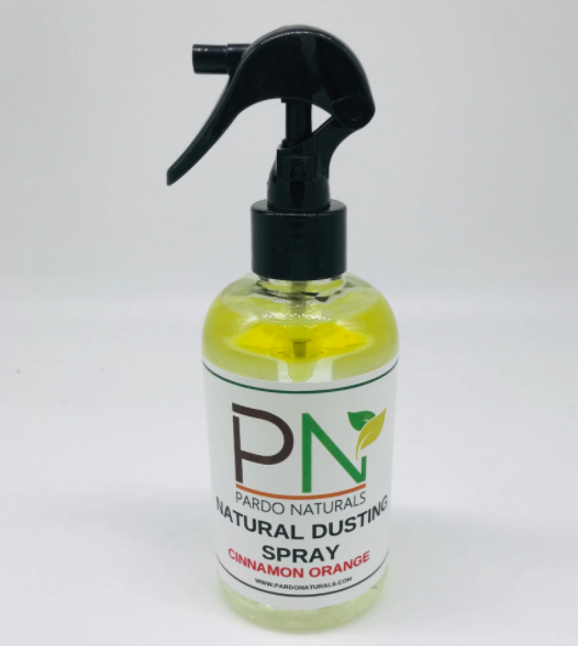 Clear and black spray bottle that says &quot;Pardo Naturals Natural Dusting Spray&quot; filled with yellow liquid