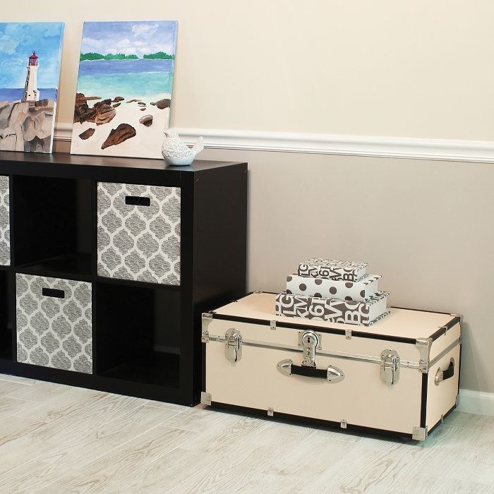 The trunk in cream with black trim and silver hardware