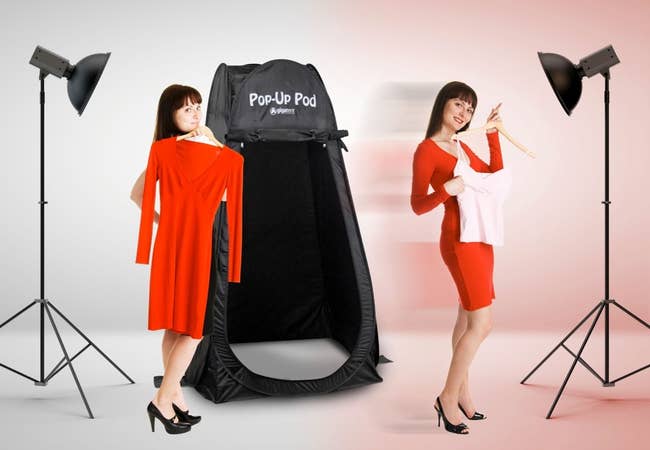 Model using the pop-up tent to change their outfit 