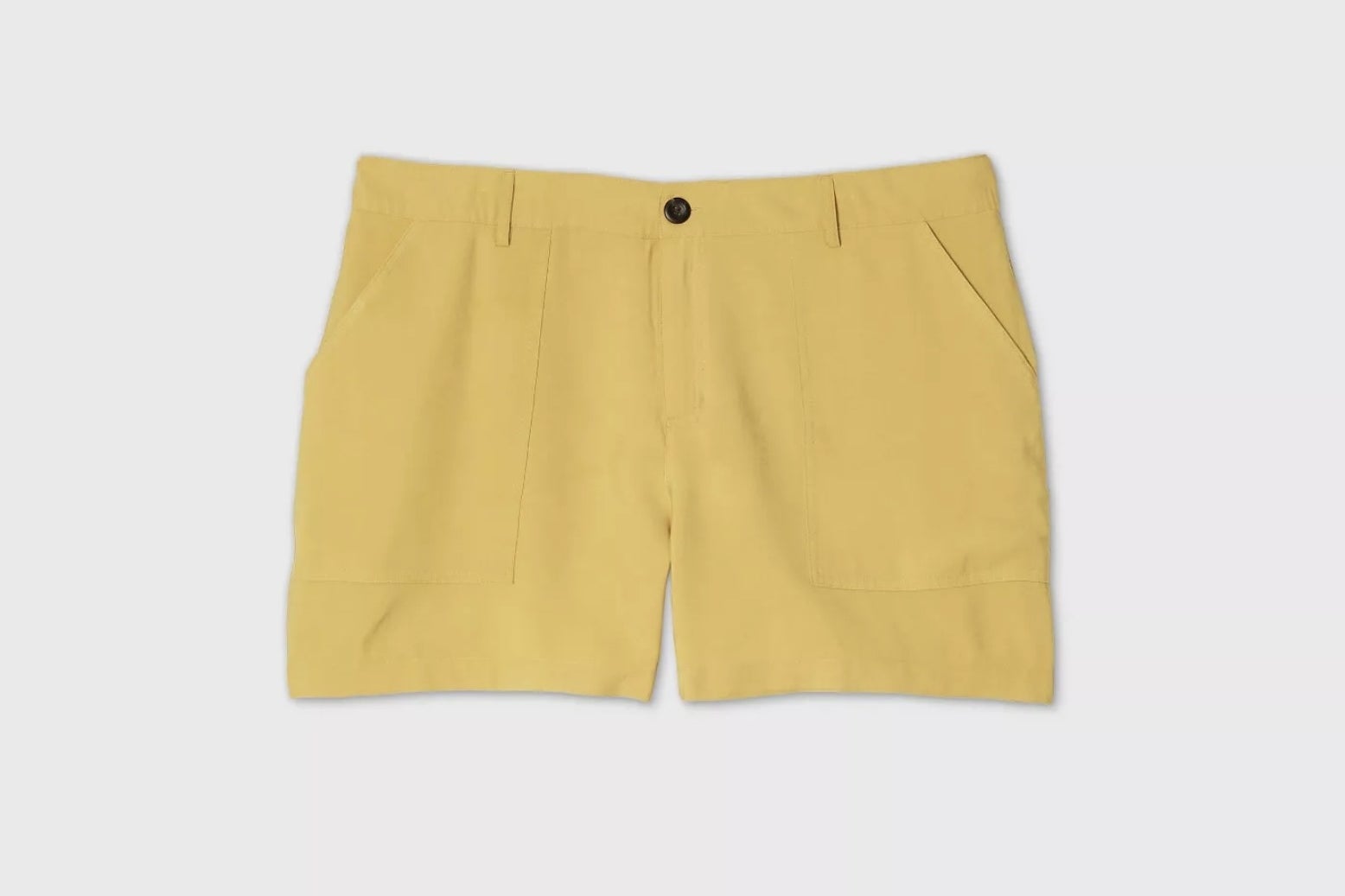 The yellow mid-rise shorts with a black button
