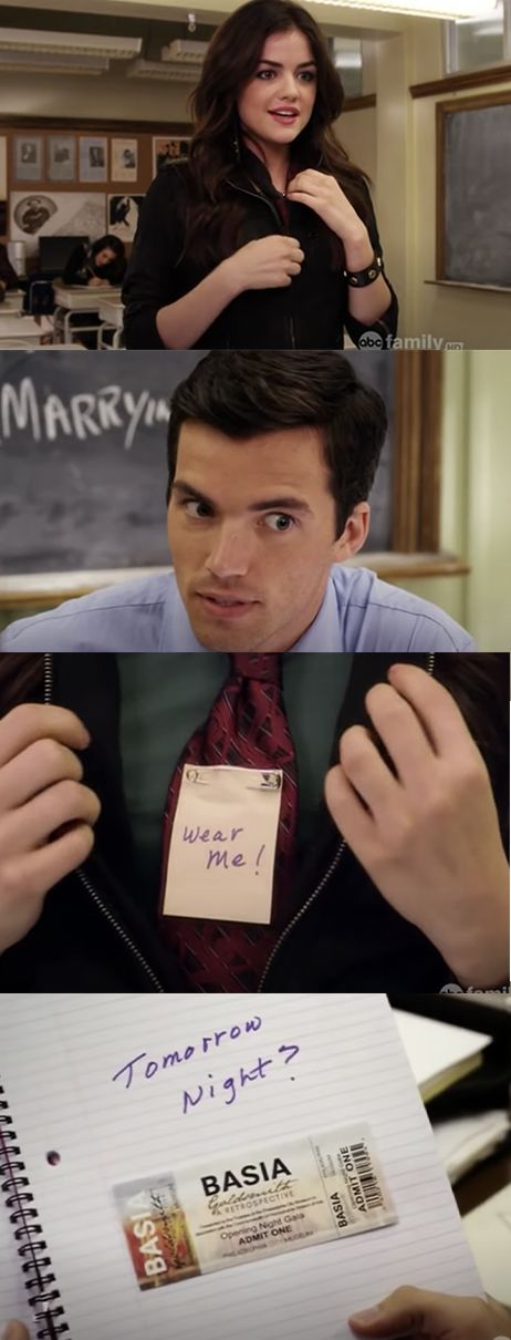 Aria unzips her jacket in class to reveal that she&#x27;s wearing a tie with the note &quot;wear me&quot; on it, then gives Ezra her notebook with a ticket to an art gallery event the next night