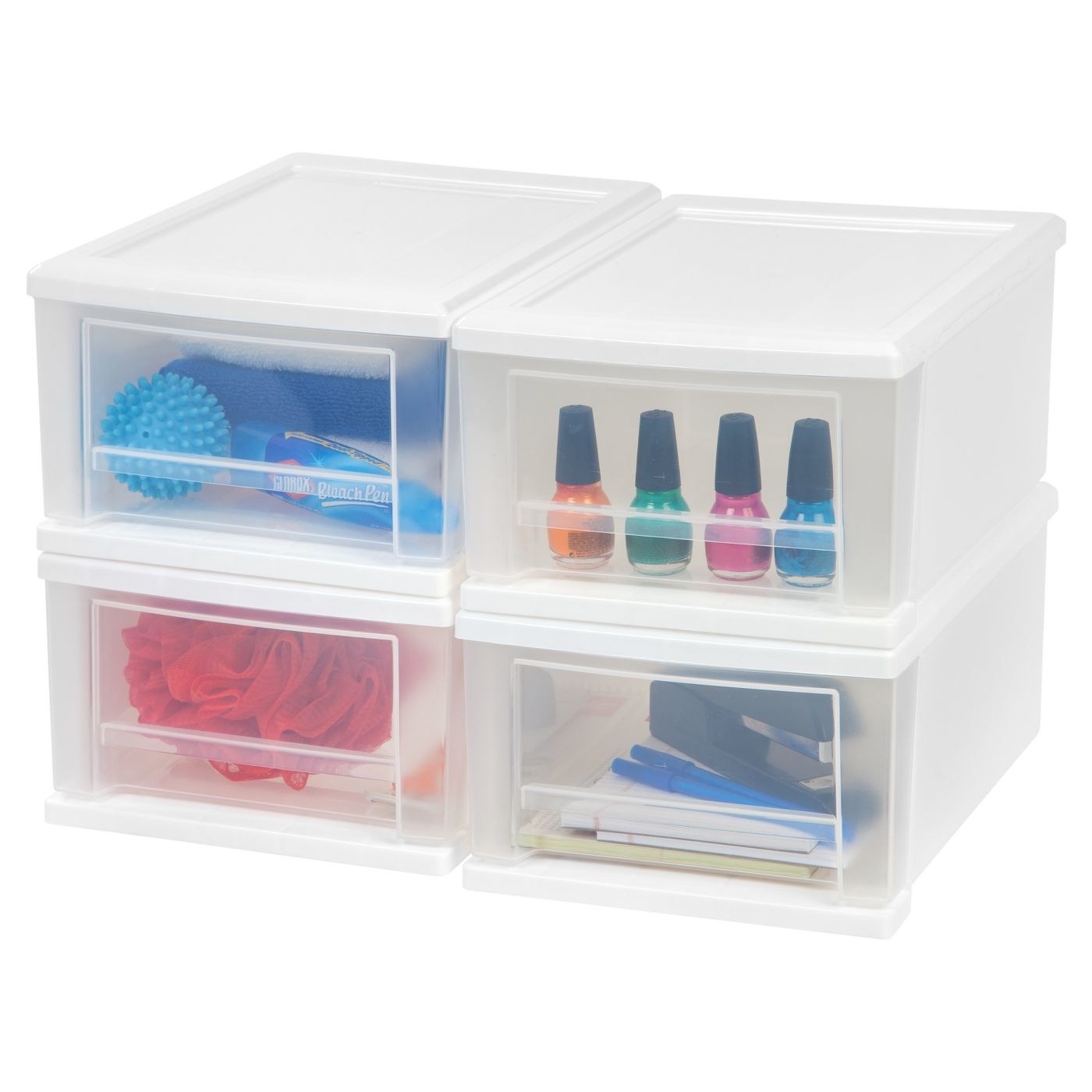 Four of the drawers stacked in a square, holding things like nail polish, office supplies, cleaning products, and toiletries