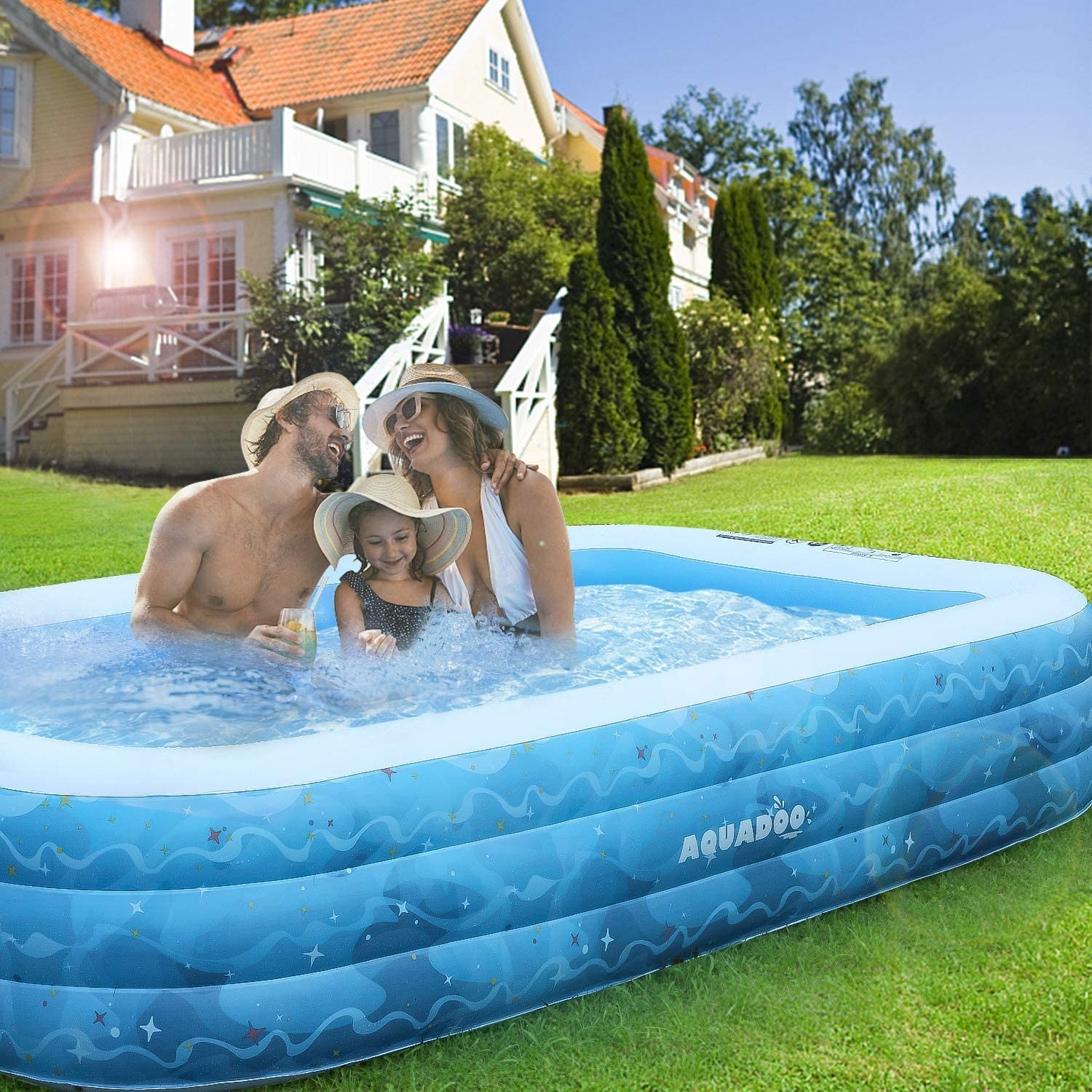 The rectangular, three-ring pool with a wave design on the side and a couple and their kid inside