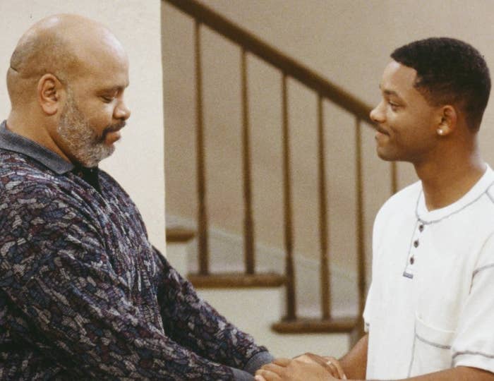 James Avery and Will Smith embrace hands, showing emotion and care for one another