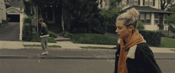 Lili Reinhart and Austin Abrams walking in sync as Grace and Henry in &quot;Chemical Hearts&quot;