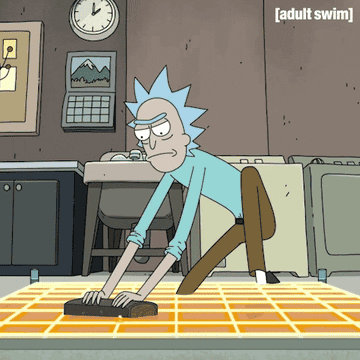Rick Sanchez from &quot;Rick and Morty&quot; scrubbing a floor with a piece of wood