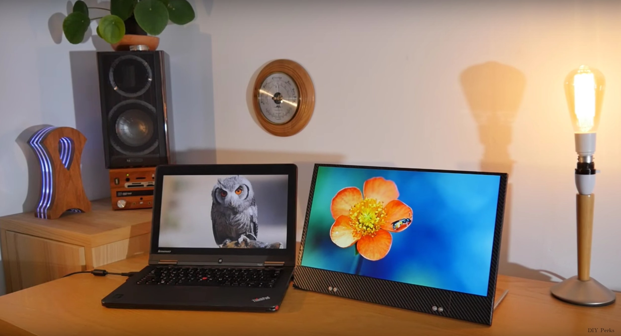 Two screen setup with a laptop and other monitor on a desk