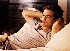 GIF of Edward sitting up in bed