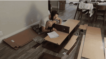 GIF of me trying to assemble a TV stand