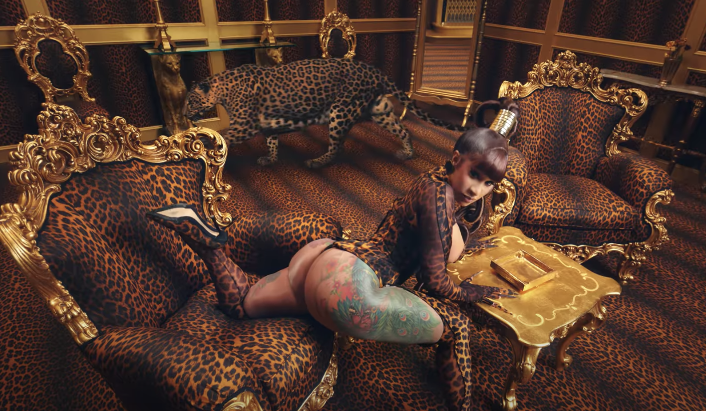 Cardi B posing with leopards, which were included in the &quot;WAP&quot; video via green screen