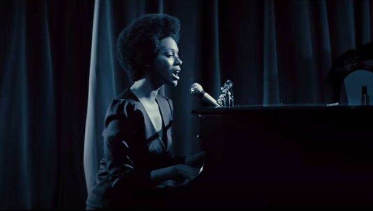 Zoe Saldana as Nina Simone in &quot;Nina&quot; playing the piano and singing 