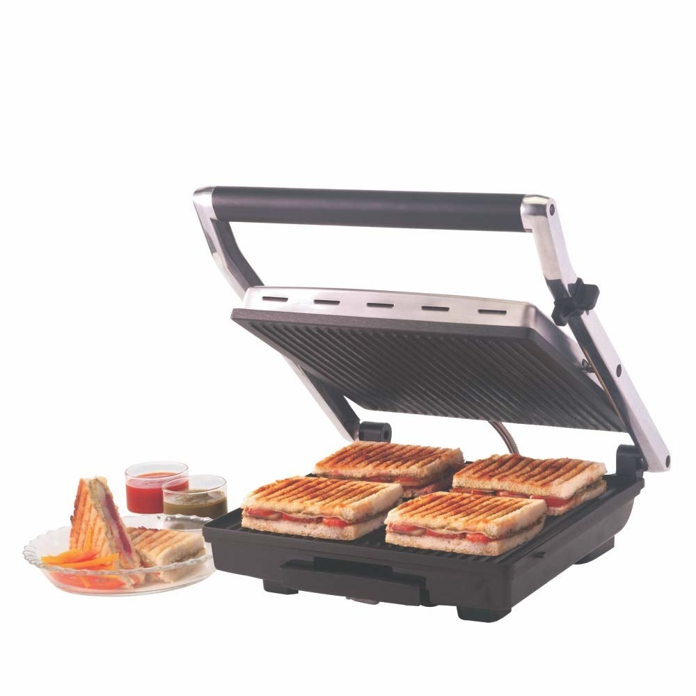 A sandwich maker with 4 sandwiches