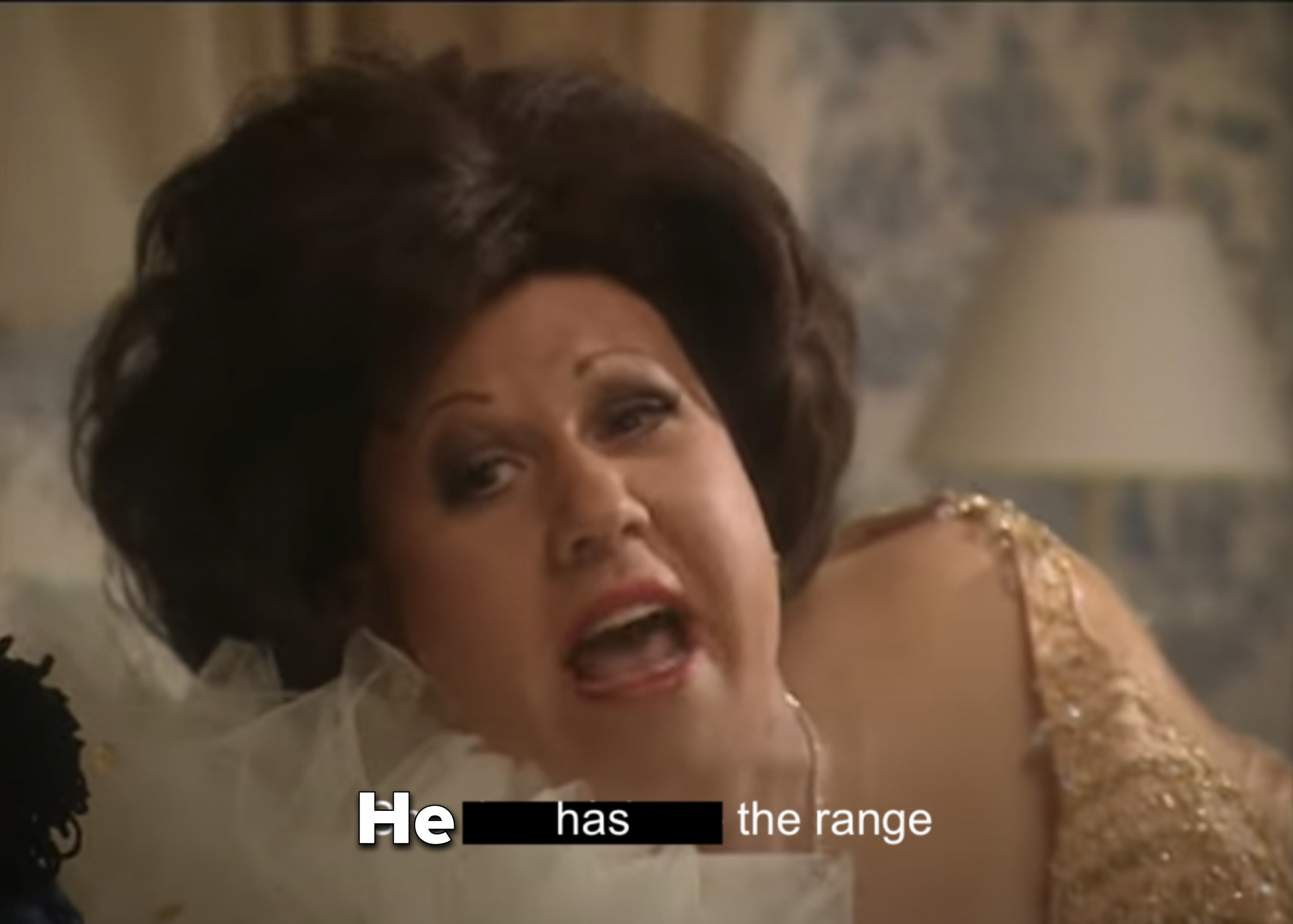 Man dressed in drag saying &quot;He has the range&quot;