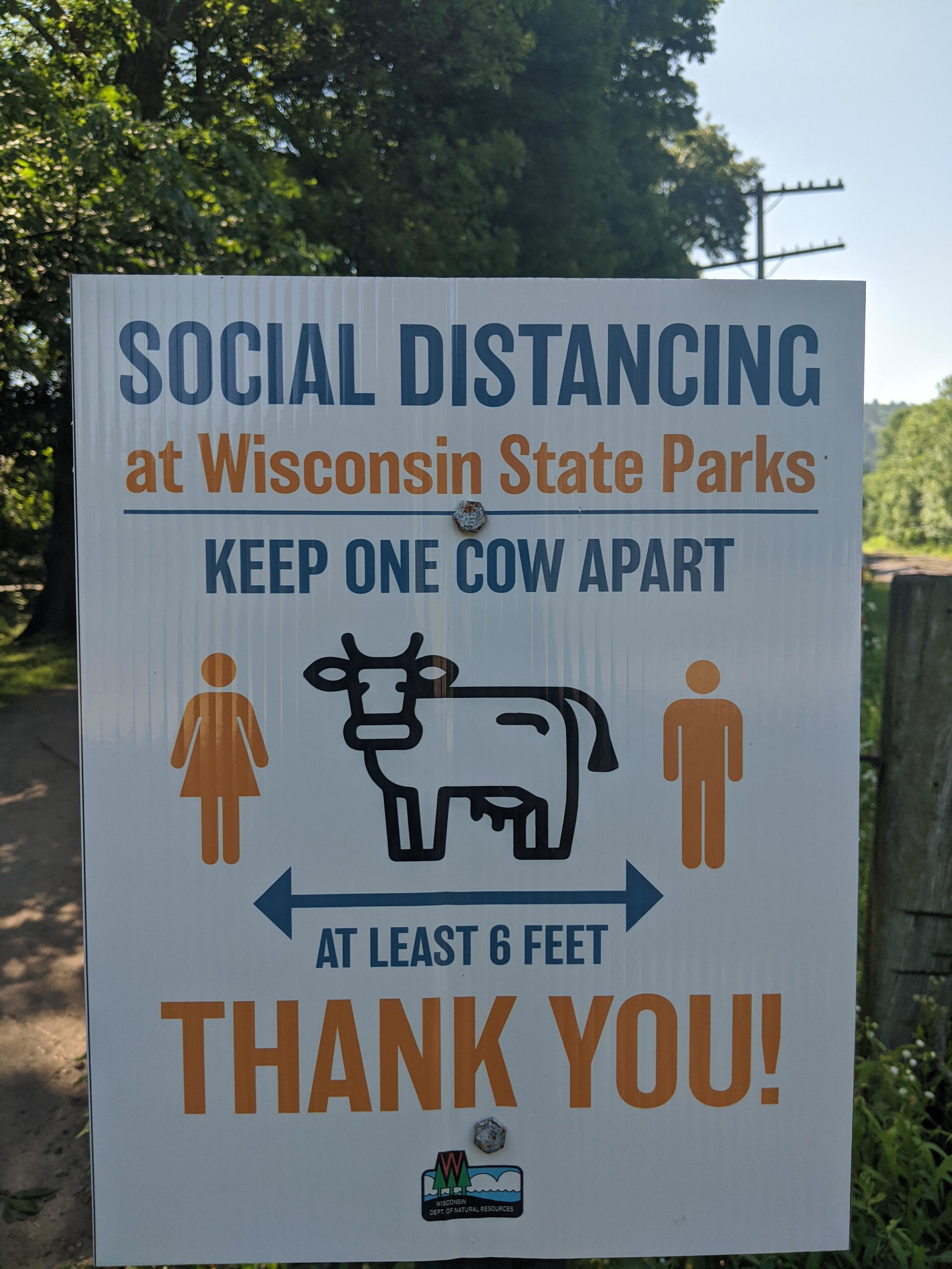 A sign in a park