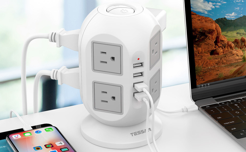 The tower-shaped charging hub with several devices plugged into it