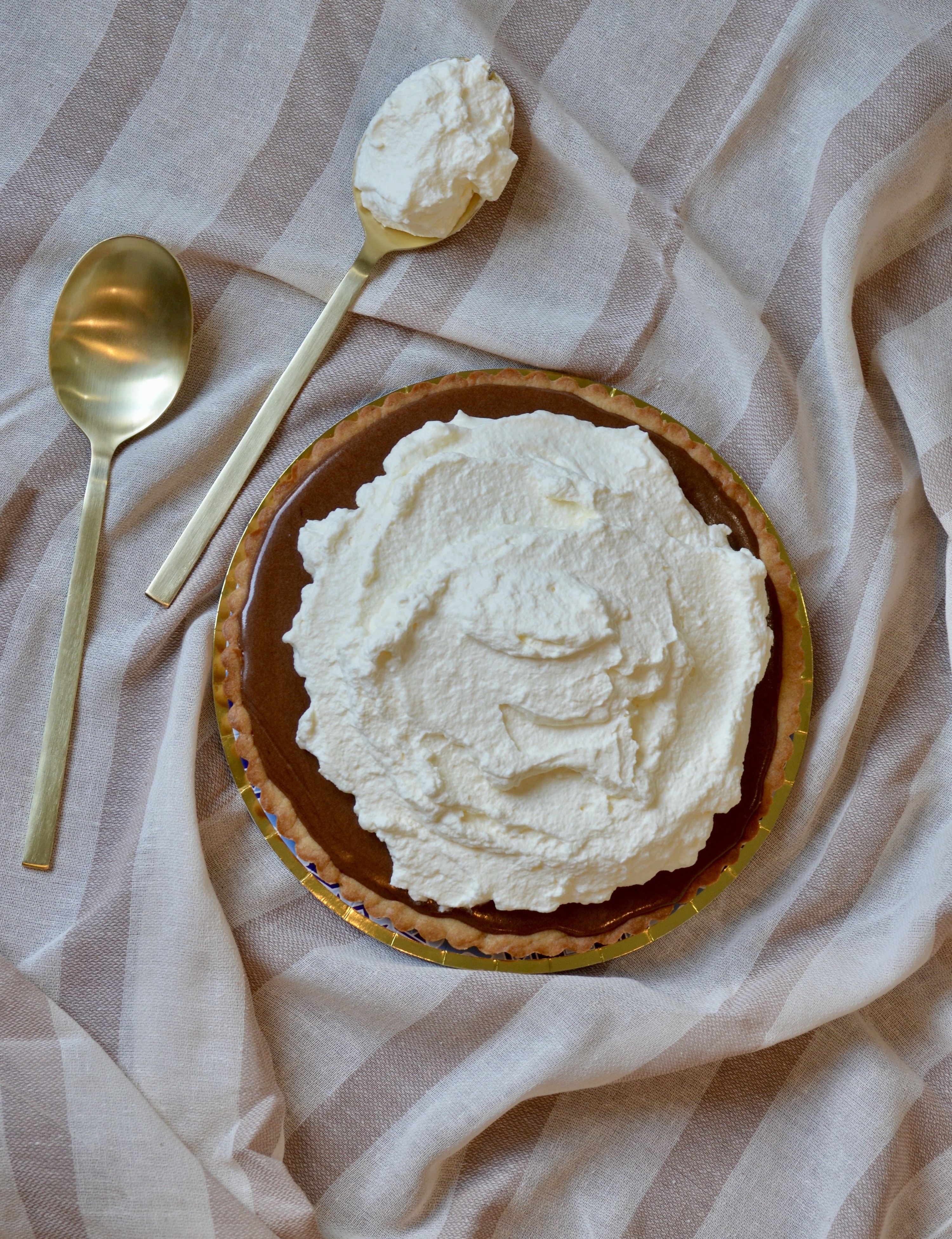 The homemade version of the French Silk Pie next to two spoons