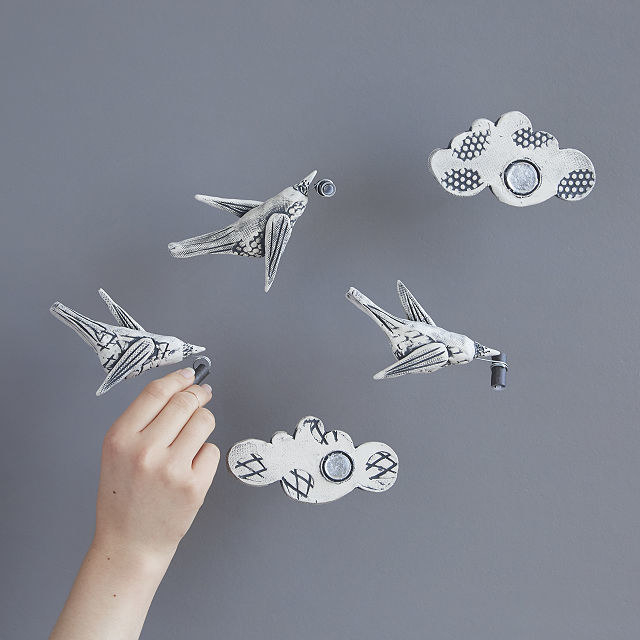 the bird sculptures made to look like they're flying