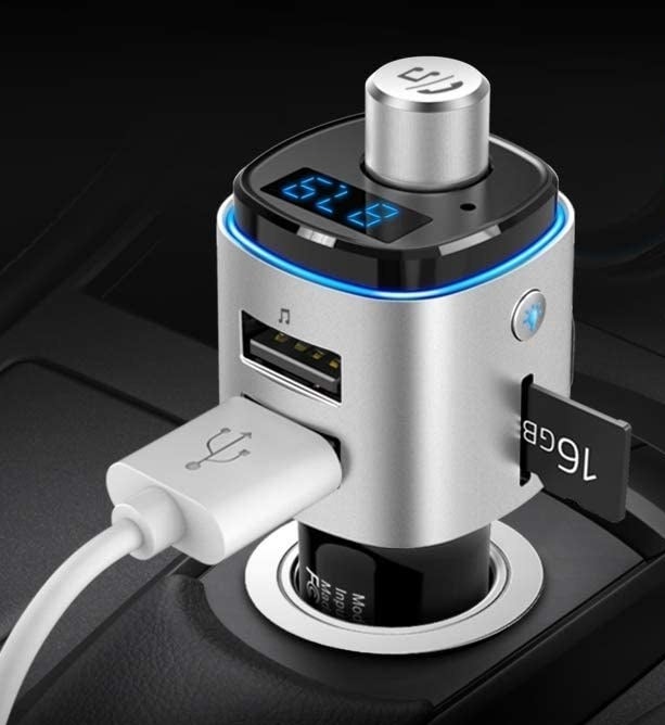 A gadget plugged into a cigarette lighter with a charger
