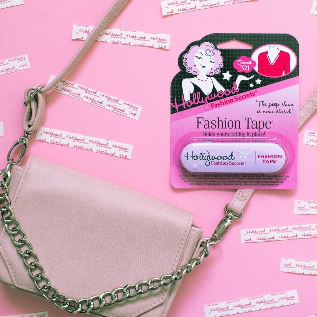 A purse surrounded by fashion tape strips