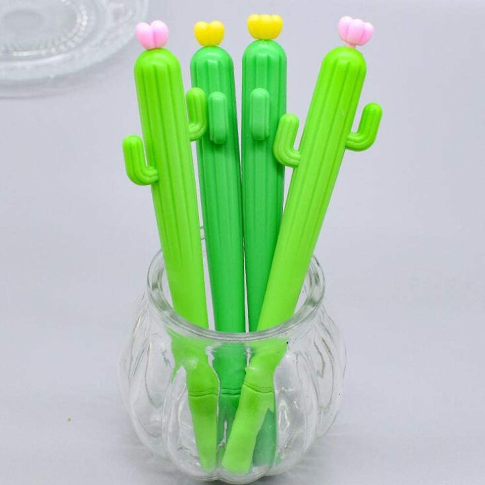 four cactus pens in a jar