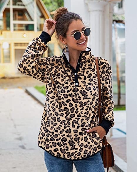 model wearing pullover leopard print fleece