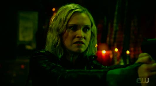 Clarke holds a gun in the final few minutes