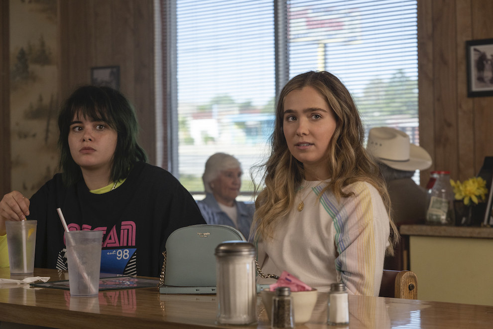 The teens sit in a diner