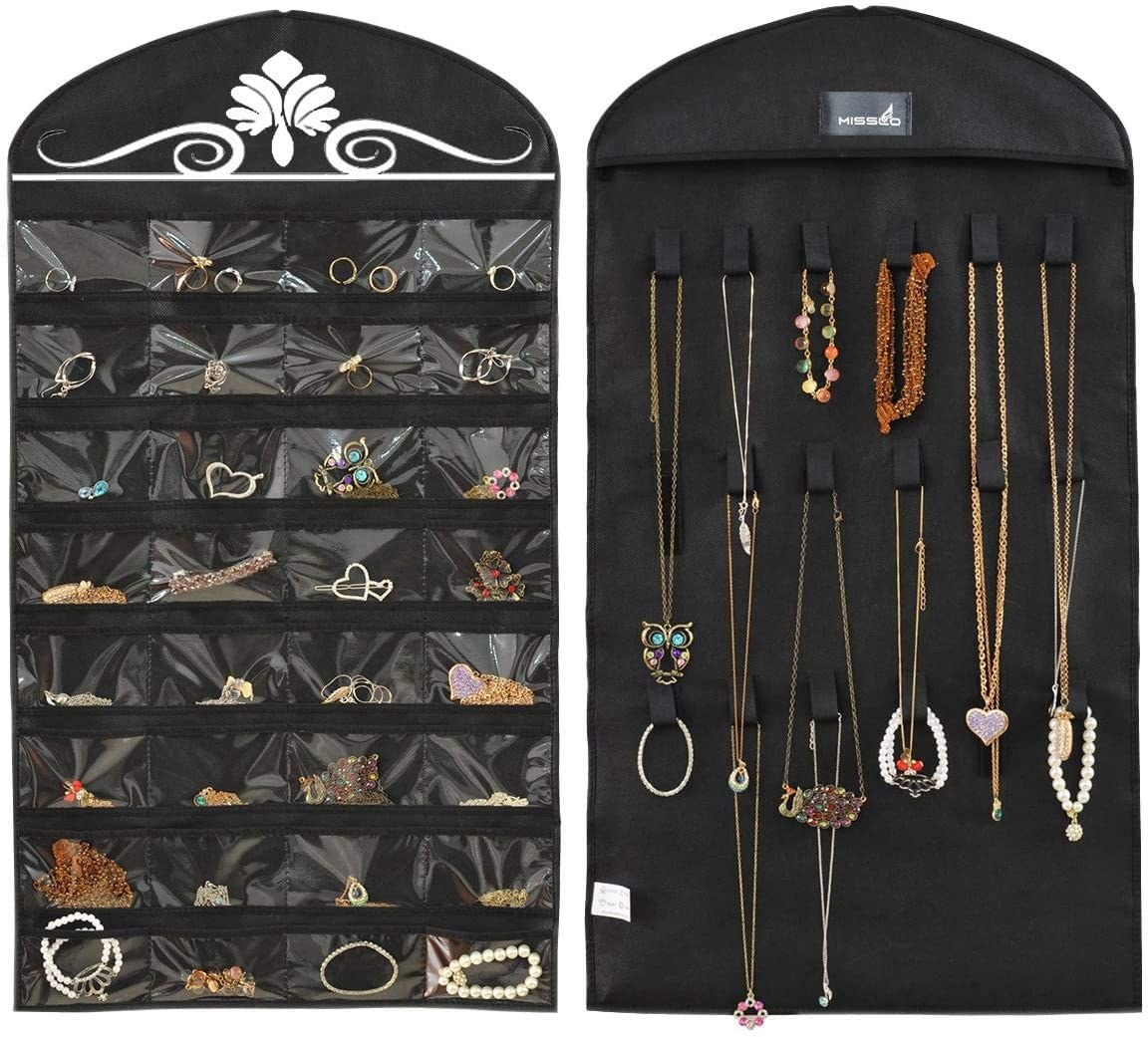 The two sided jewellery hanger which has pockets for earrings, bracelets and rings, and the other side has room to hang necklaces