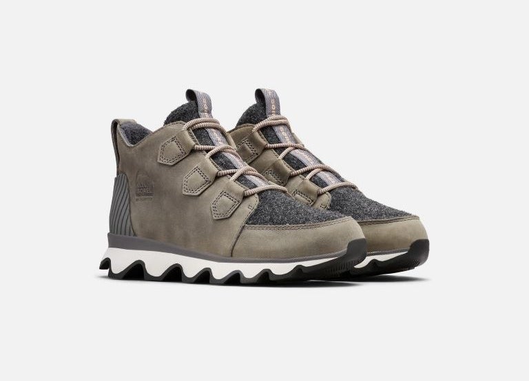 The sneaker-style shoe with white sole, olive green and dark grey body and laces.
