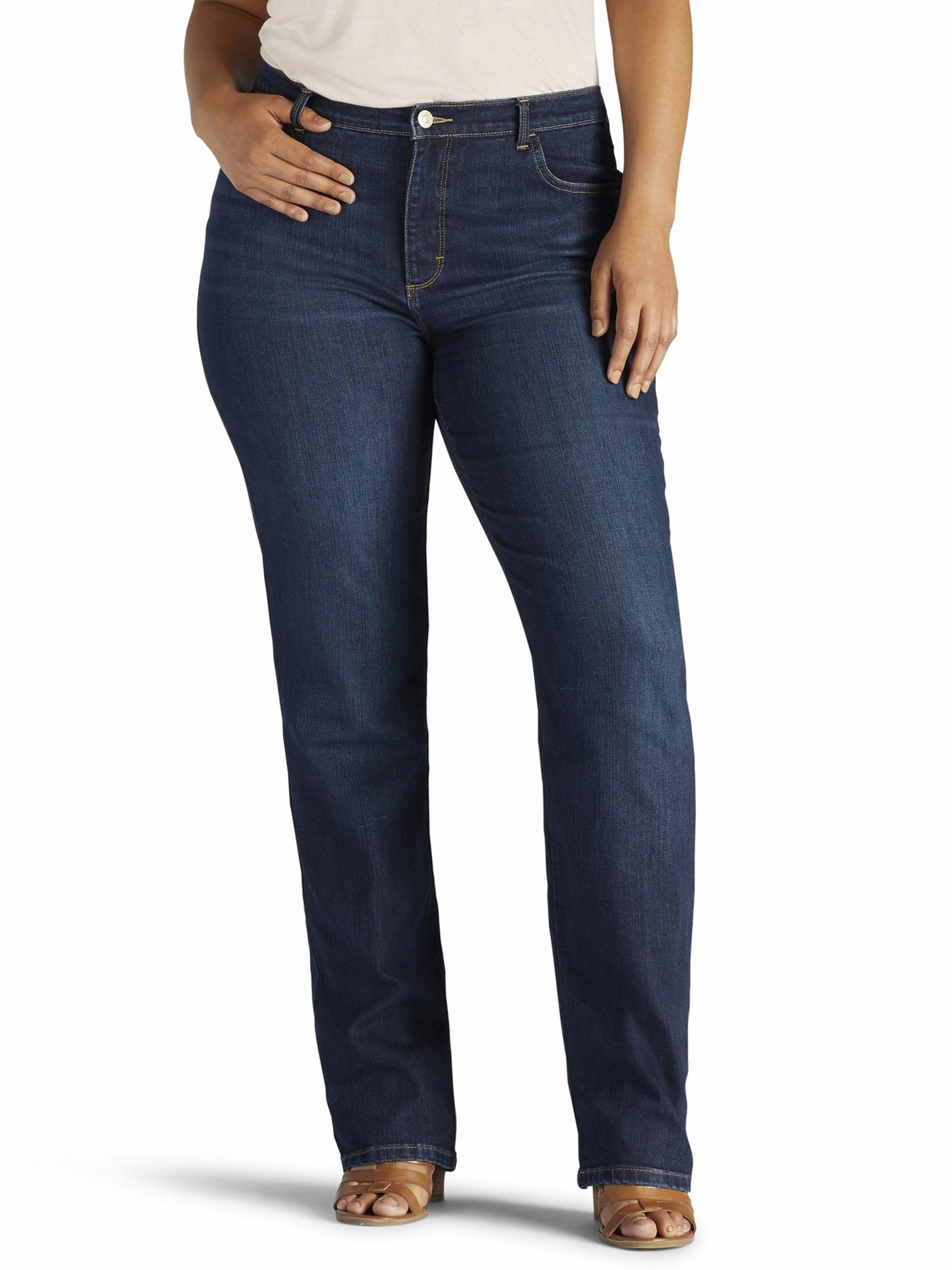 model wearing dark blue jeans with hand in their pocket