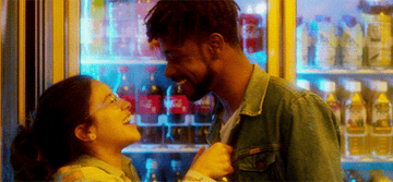 Jenny and Nate from &quot;Someone Great&quot; kissing at a bodega