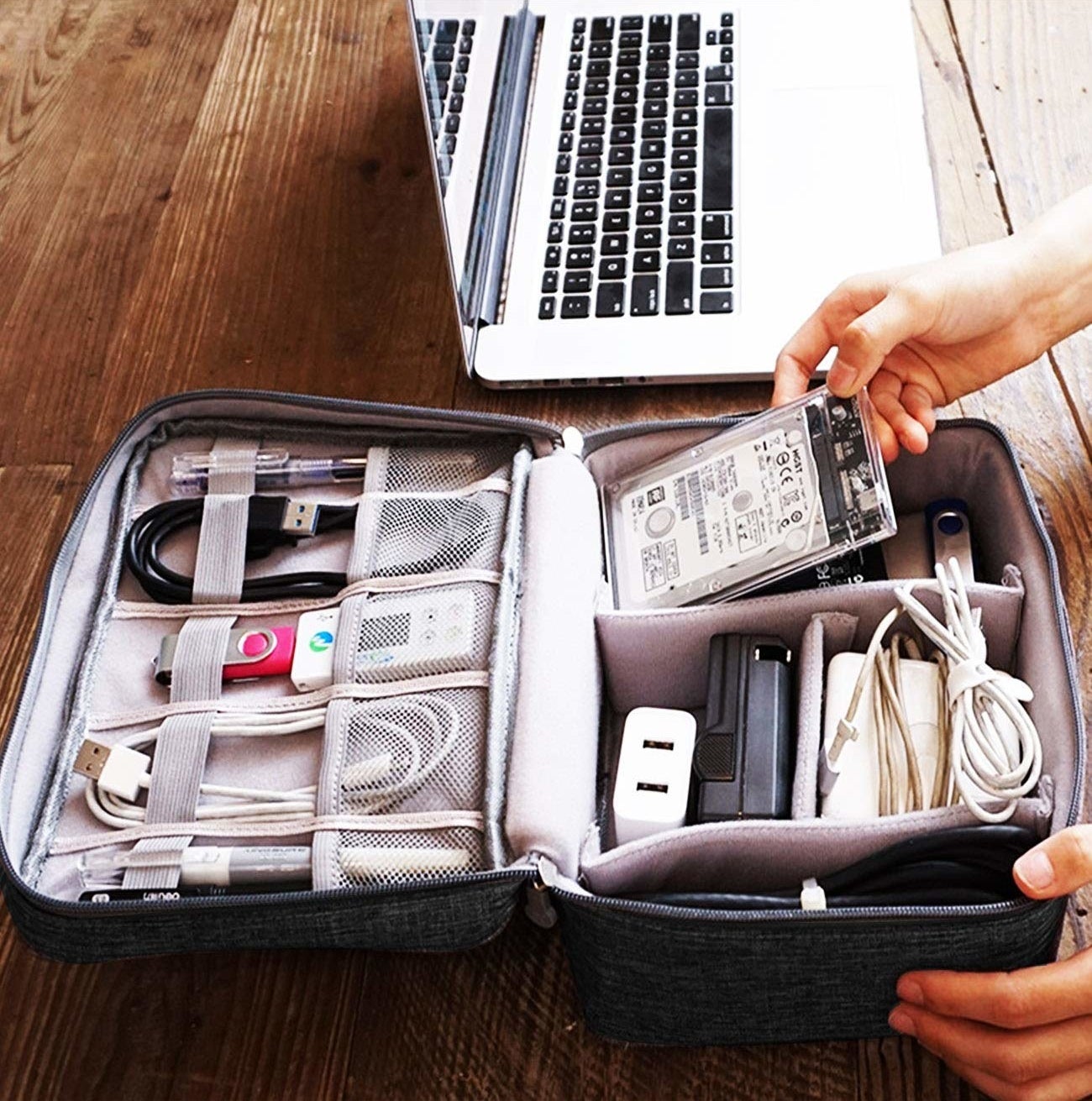 Cables, chargers, pen drives and other electronic equipment stored neatly in the organiser