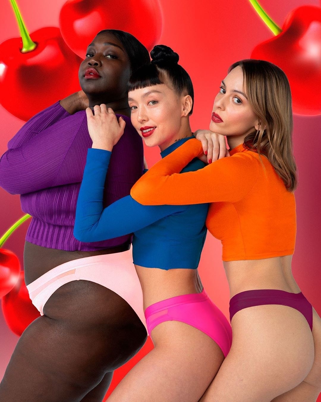 three models wearing light pink, hot pink, and burgundy underwear