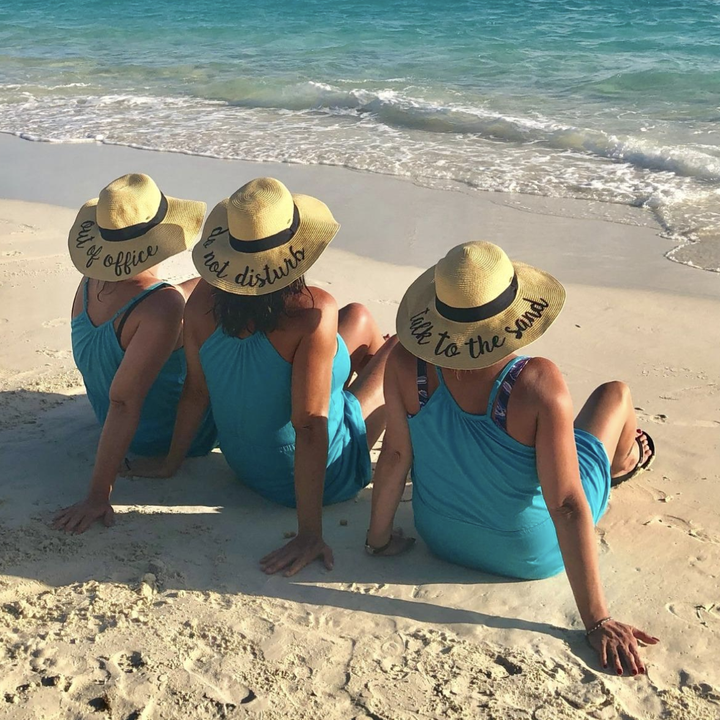 Reviewer image of three people in the hats 