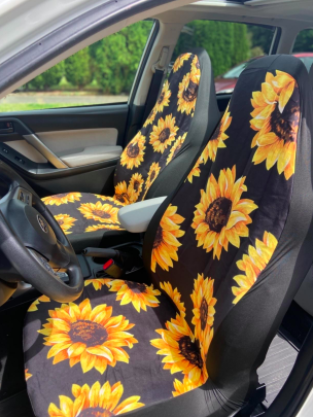 inside of a car with the two black and snowflower print 
