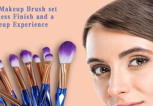 A set of makeup brushes with purple tips