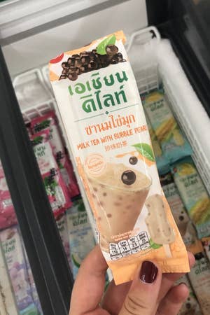 A popsicle made from Thai milk tea and jelly pearls