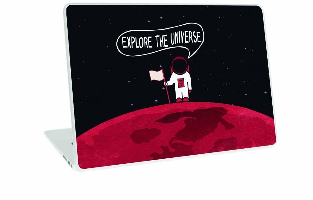 A laptop with a skin that has an astronaut on a planet saying &quot;Explore the universe&quot;