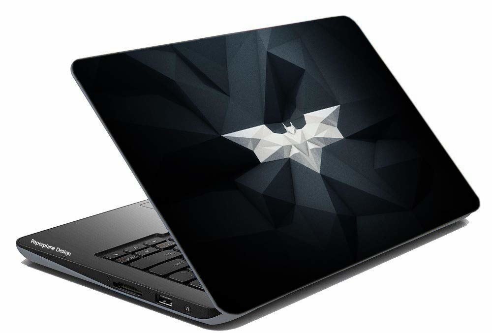 A laptop with a Batman logo skin on it