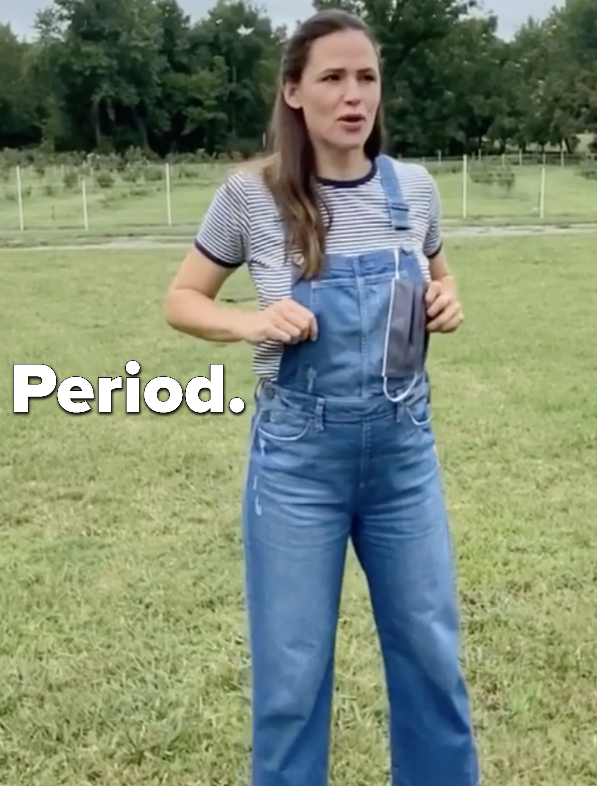 &quot;Period&quot; text next to Jennifer in overalls.