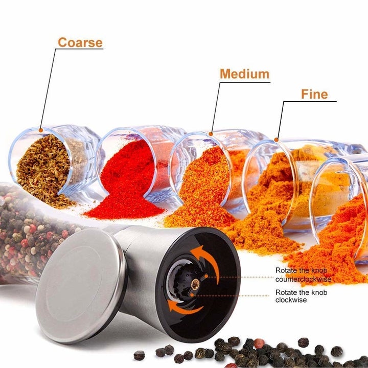 Bottles containing spices varying from coarse to fine texture.