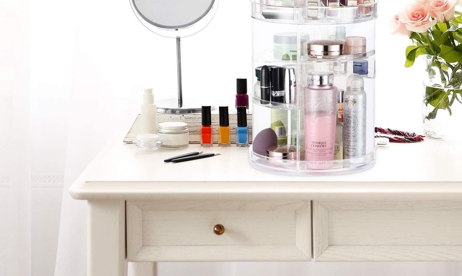 A makeup caddy that rotates and is filled with makeup