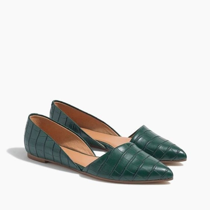 The green croc-embossed flats