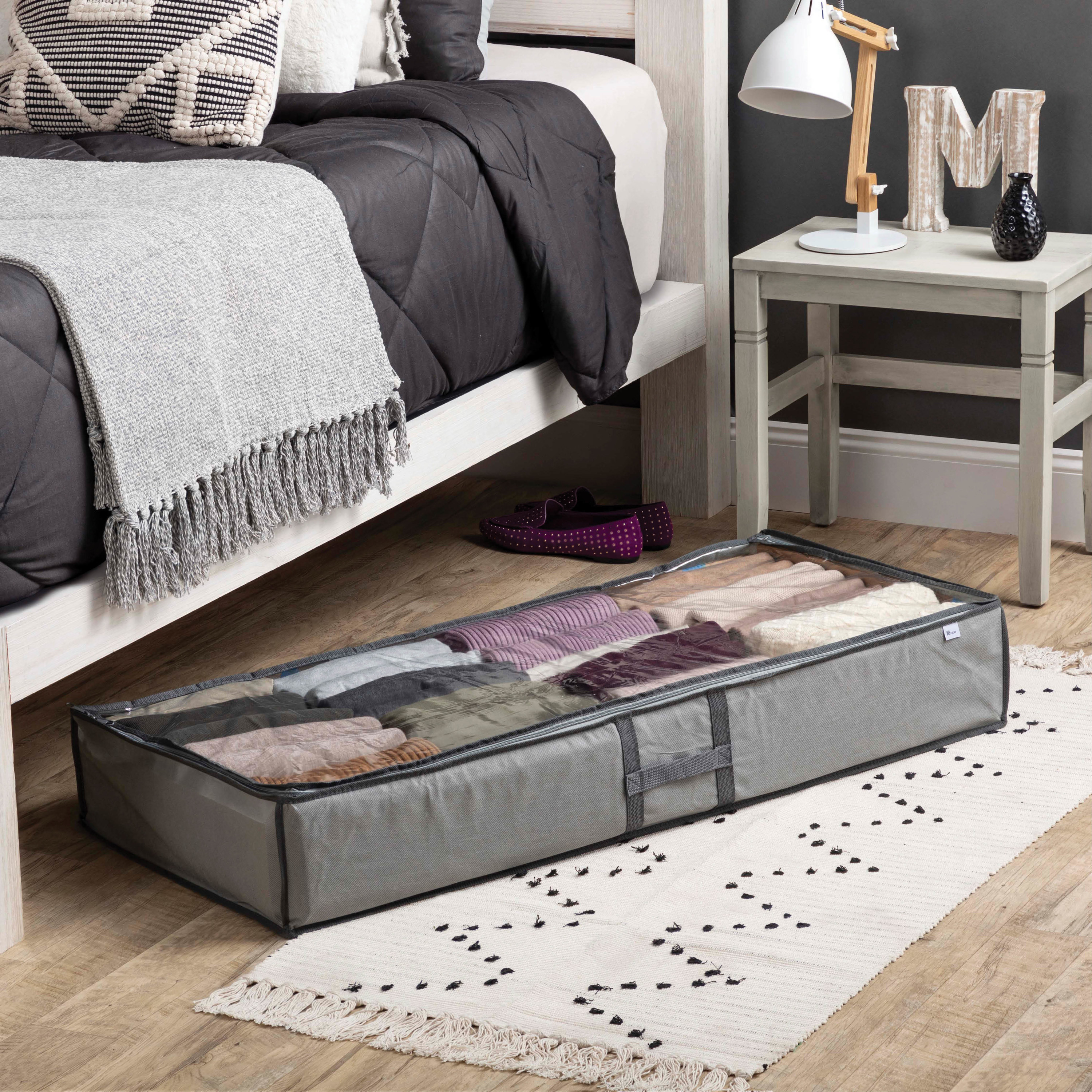 A gray fabric bag to store under the bed