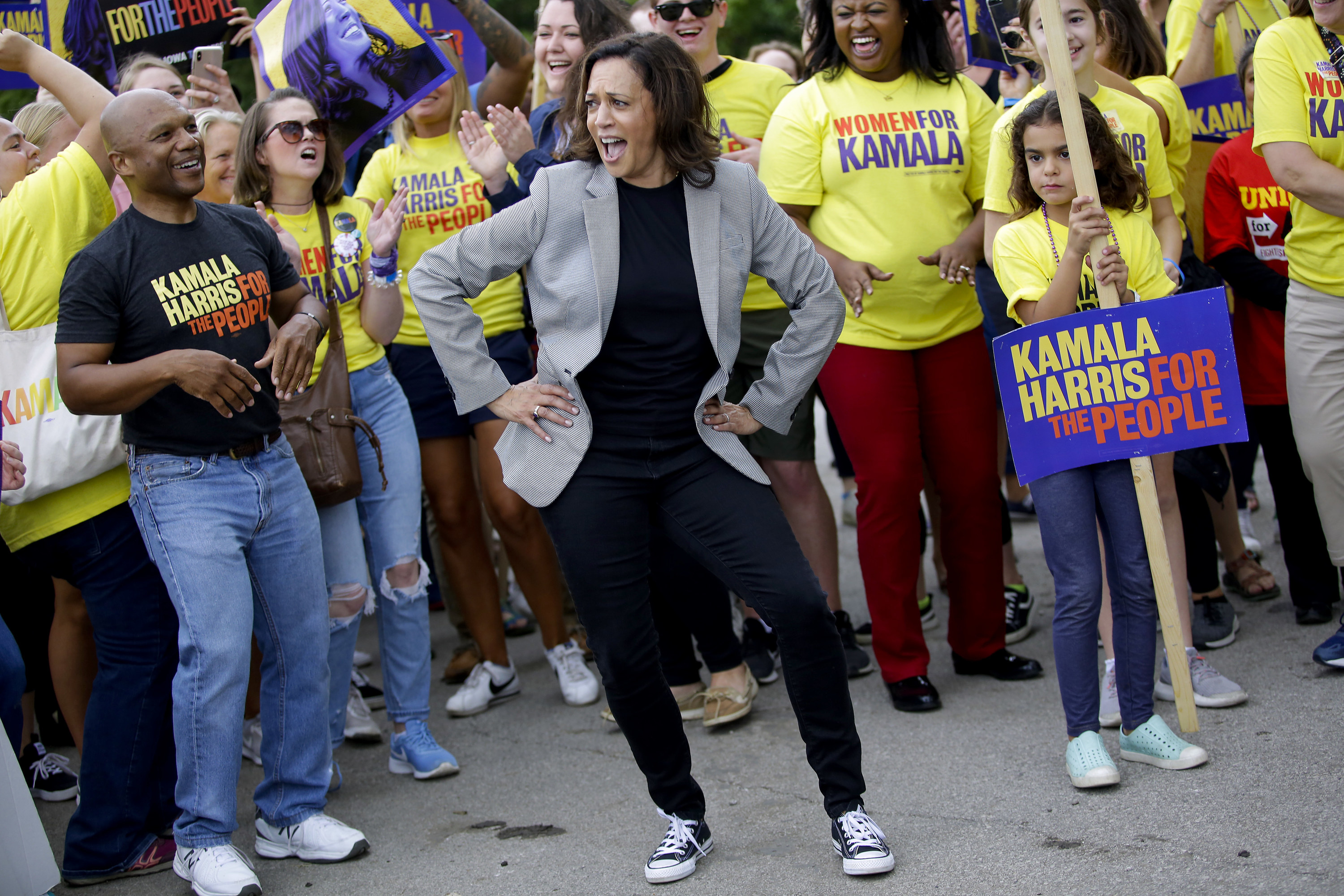 Kamala Harris, wearing black Converse sneakers, at a campaign event in California.
