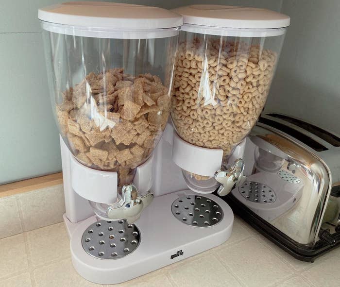 The cereal dispenser holding two kinds of cereal