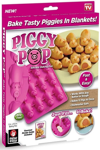 The packaging, showing the pink pig-shaped mold and pigs in a blanket made in it