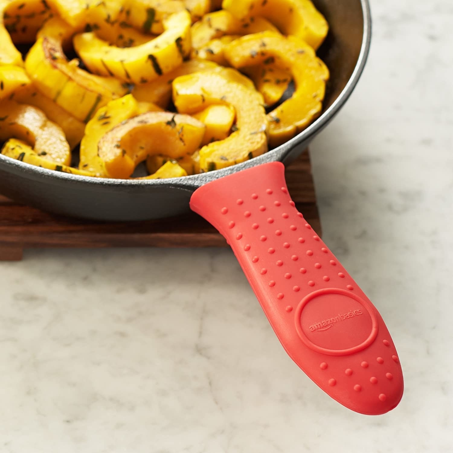 A silicone handle cover over a pan handle