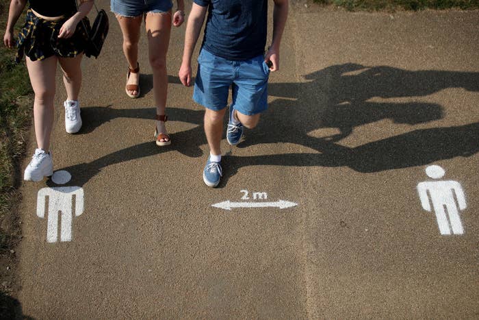 Social distancing markers on pavement