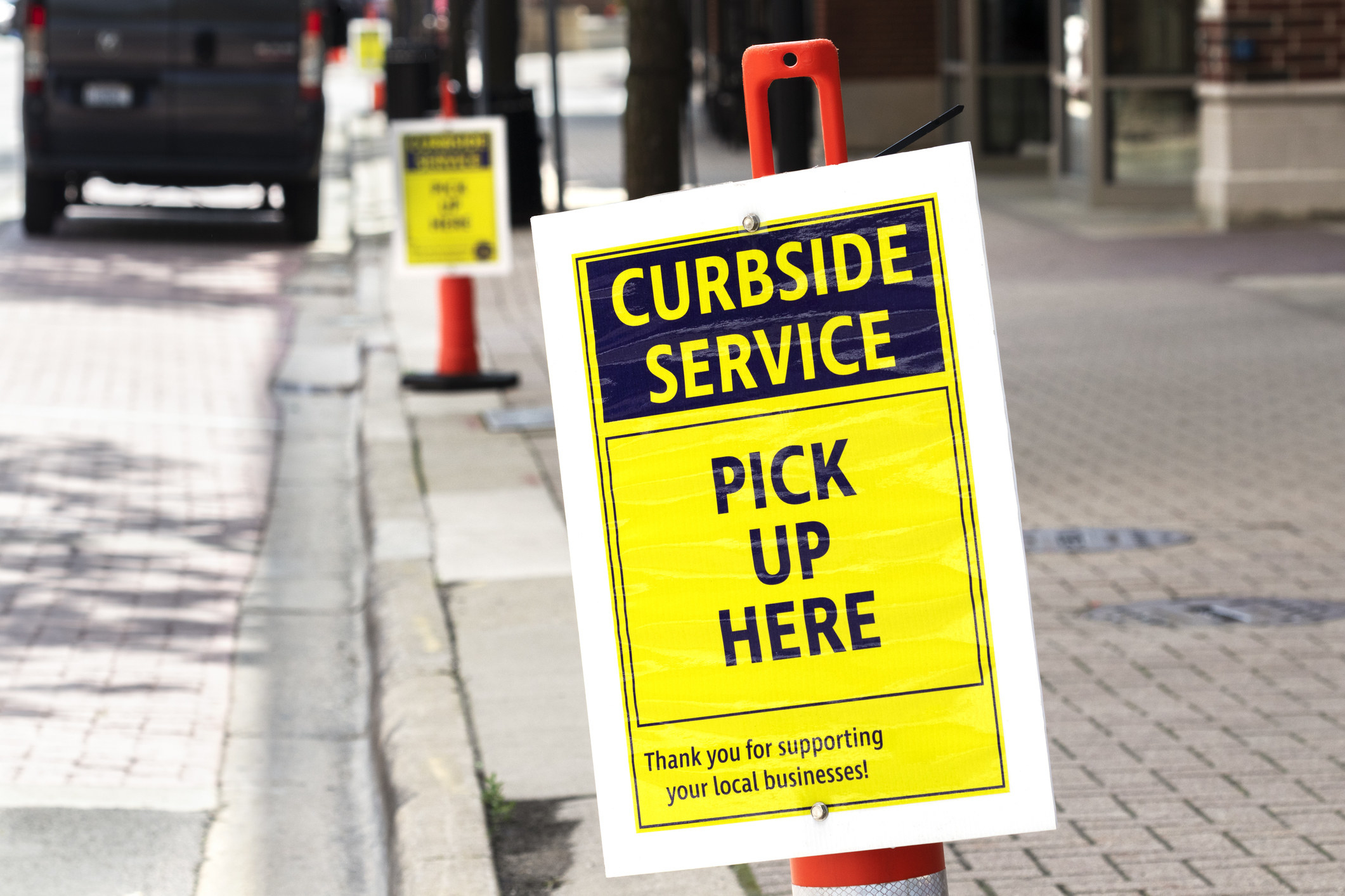 A curbside pickup sign